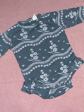 Kate Quinn leg ruffle bodysuit